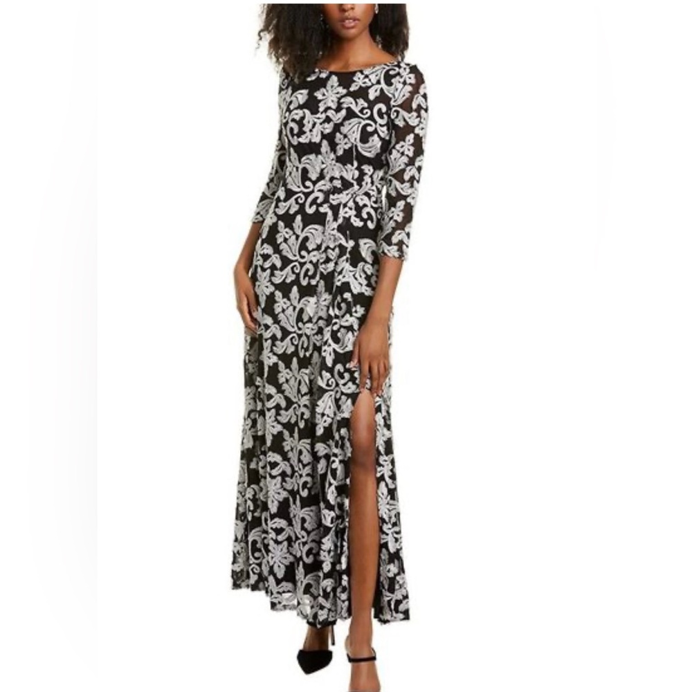 J S Designs Boat neck,3/4 sleeve embroidered, black mesh gown that is NWTS. Sz.4